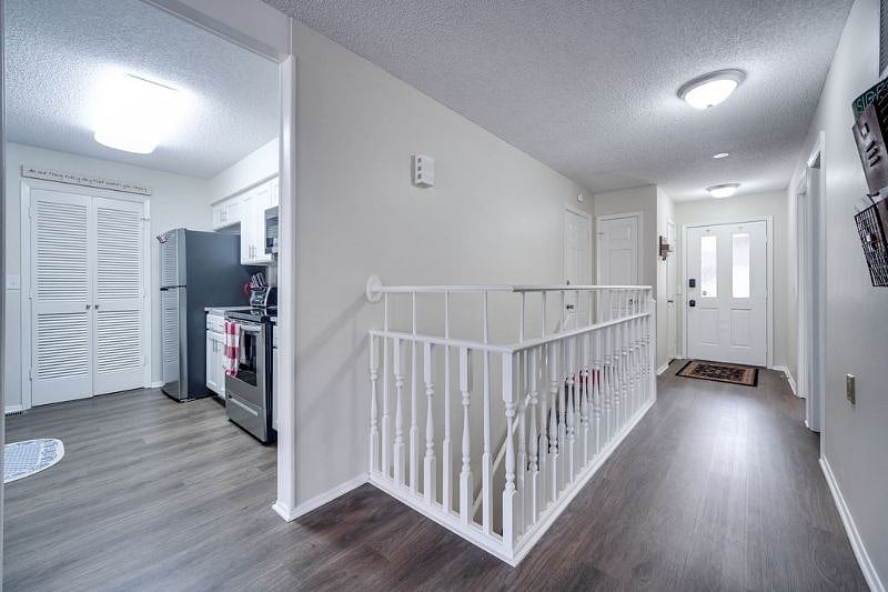 Entryway and stairs down to the first level.