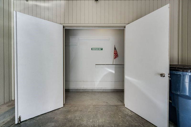 Locking storage closet in the carport for bikes or extra belongings (not pictured, but a bike rack has been added inside the closet).
