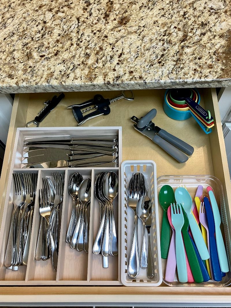 Utensils (plus kid-friendly ones), bottle and can opener, and measuring cups provided. 