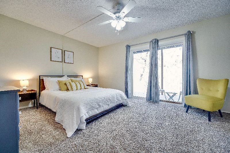 Bedroom #2: Downstairs bedroom with queen bed and private patio!