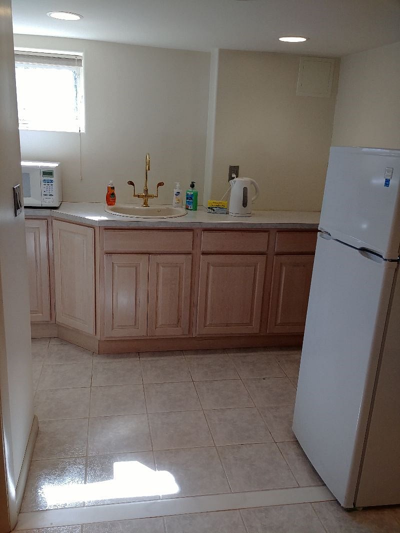 Kitchenette. Microwave and 3/4 size fridge.