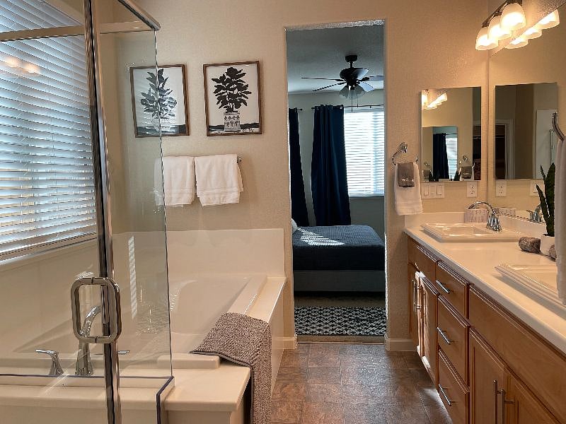 Master bathroom overlooks the master bedroom.