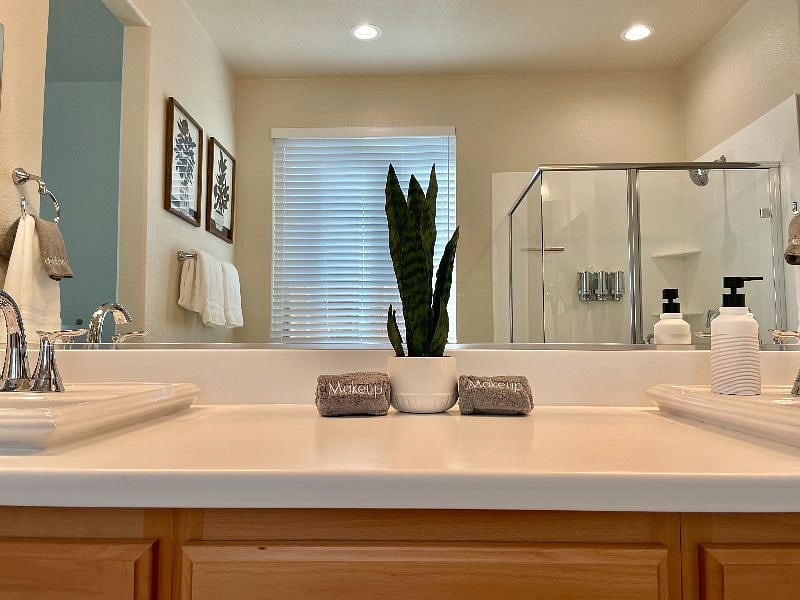 Master bathroom with double sinks.