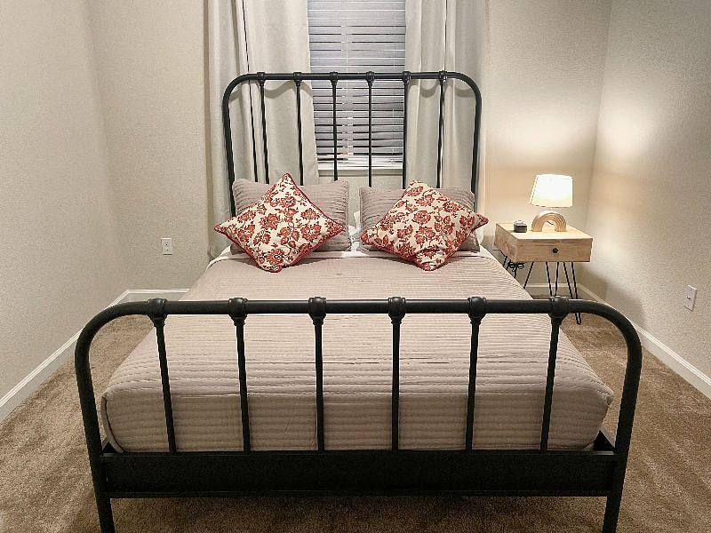 Bedroom 3 with Queen size bed, black out curtains and white noise machine.