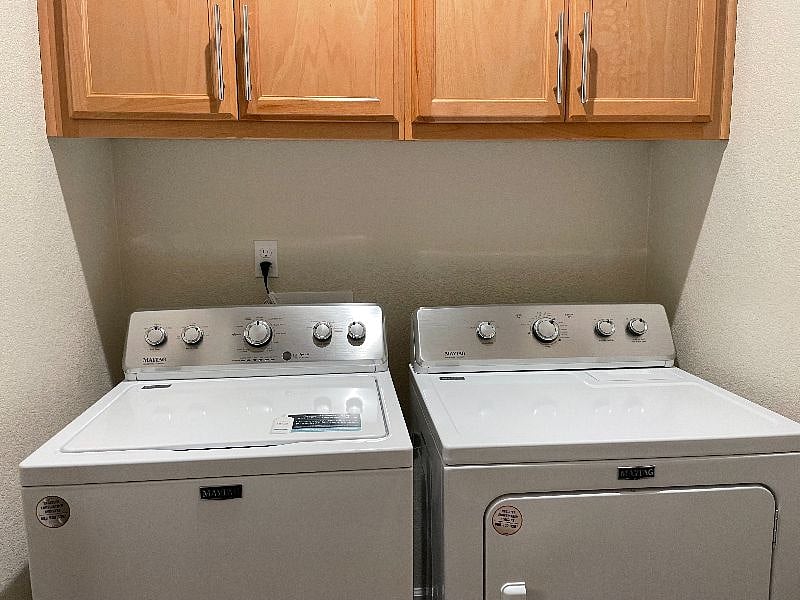 Laundry room with washer and dryer.