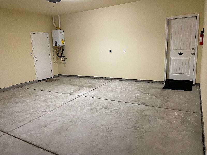 2 car covered garage with outlet for charging your electric car.