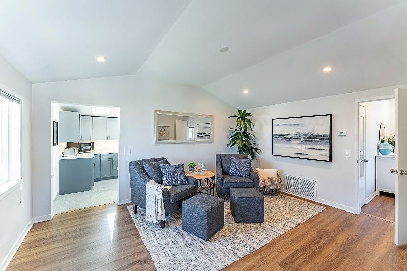 The peaceful decor invites you in. Put your feet up and relax in the comfy living room chairs. From the chairs you have views of the Monterey Bay through the trees.