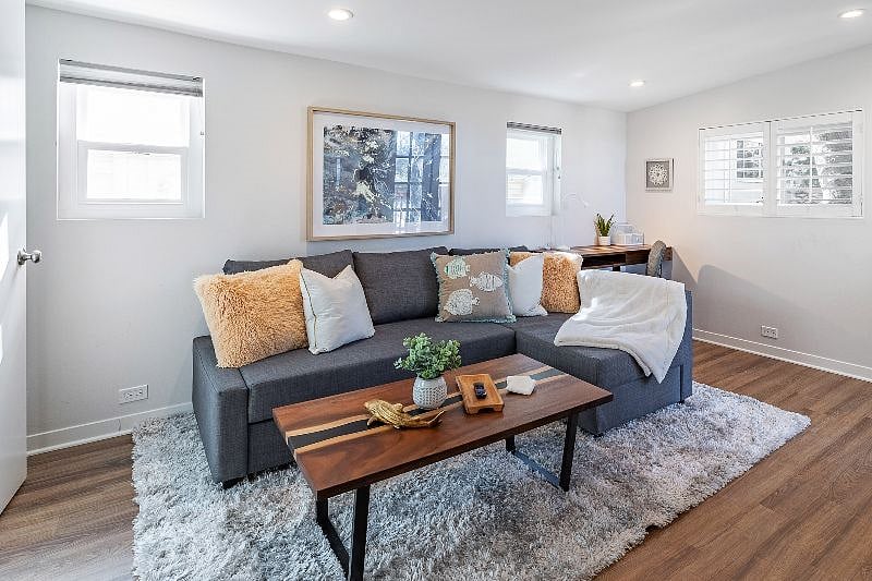 With a sleeper sofa, desk, TV, and ensuite bathroom, this room can easily serve as a second bedroom.