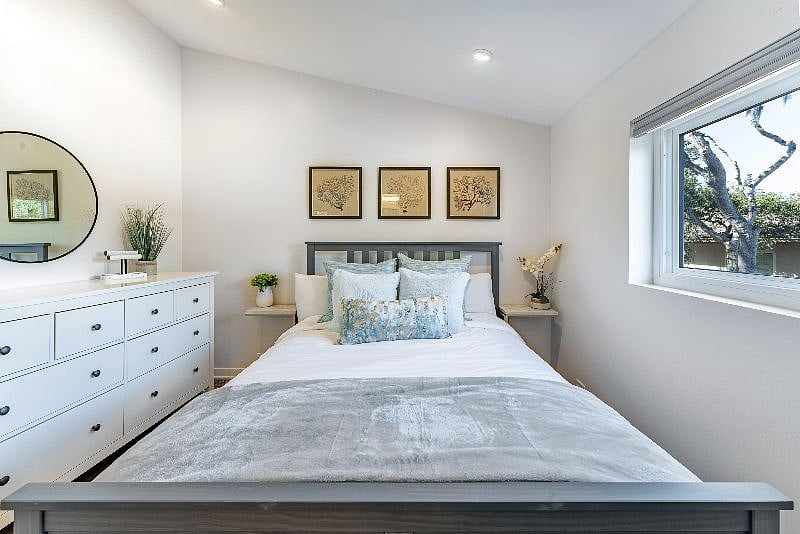A comfortable queen bed, with clean, cozy bedding will lull you to sleep. And a large dresser, walk-in closet, and under-bed drawers will provide all of the storage space you need.