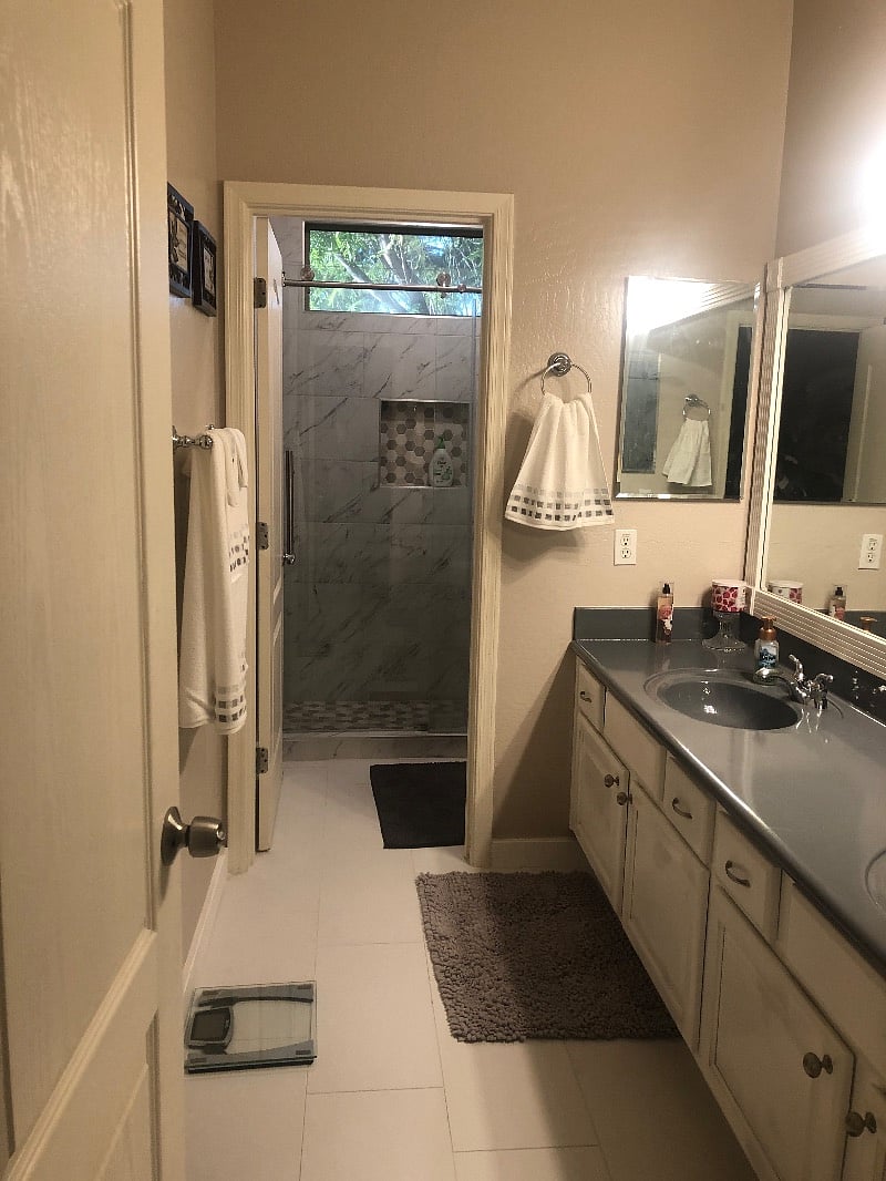 Double sink vanity bath, private toilet and shower