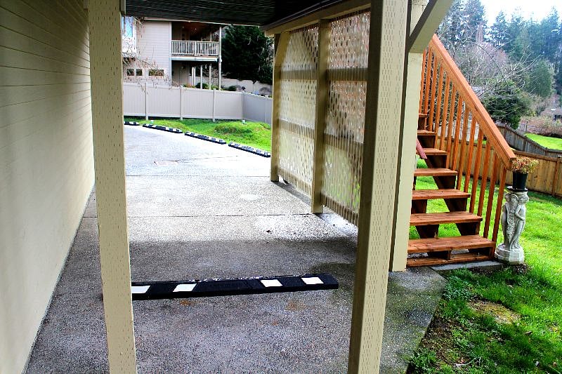 Private Carport & Stairs to Deck