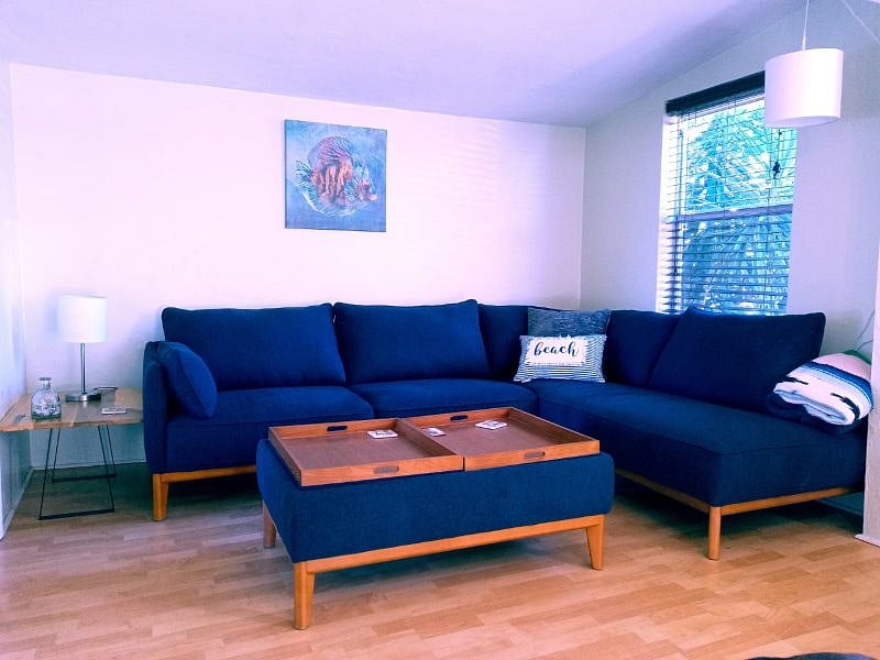 Living room leads to screened porch 