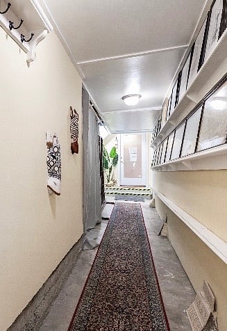 Private corridor leading to the studio apartment