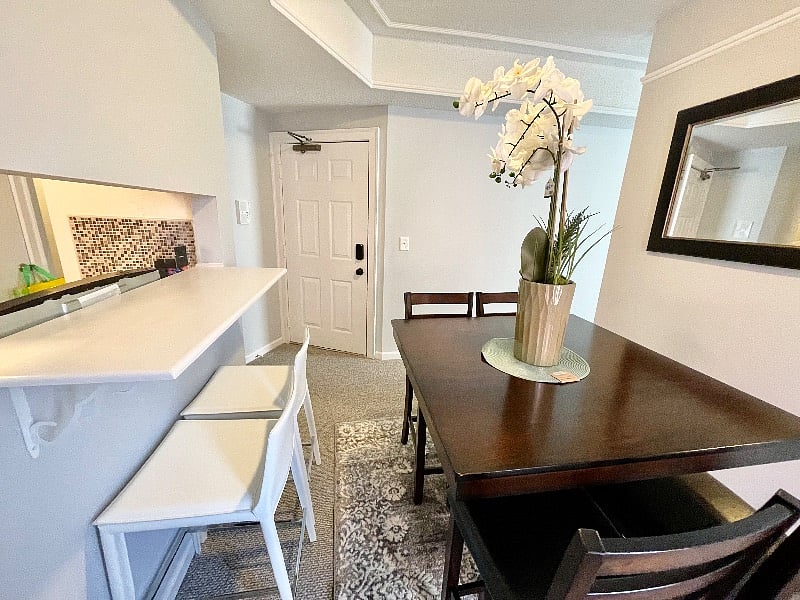 Separate dining room with eat-in bar area