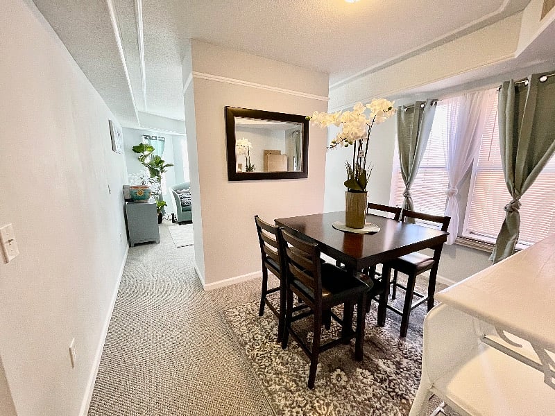 Separate dining room with eat-in bar area
