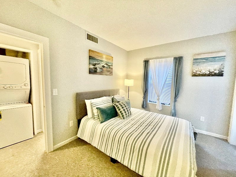 Master bedroom with large closet, private balcony