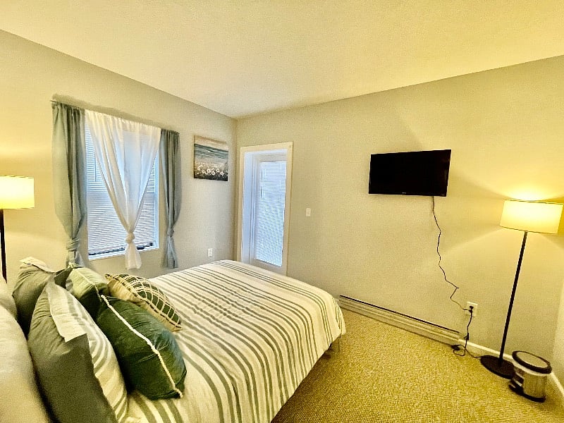 Master bedroom with large closet, private balcony