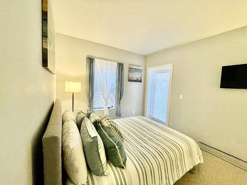 Master bedroom with large closet, private balcony