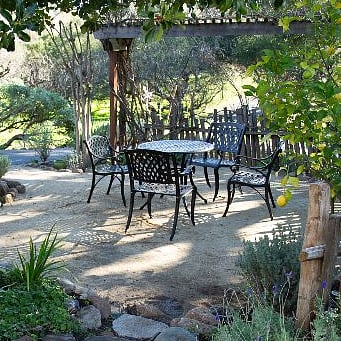 Bistro table & chairs just outside the entrance to the Studio.