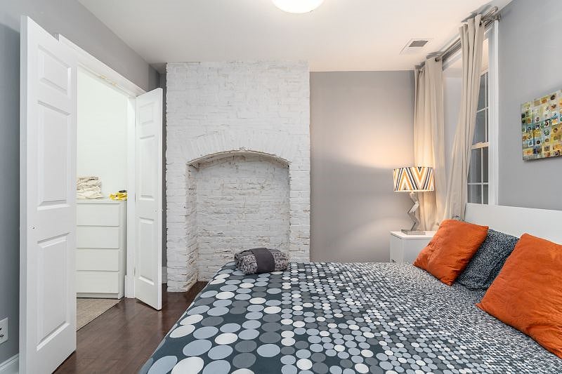 first bedroom with walk in closet