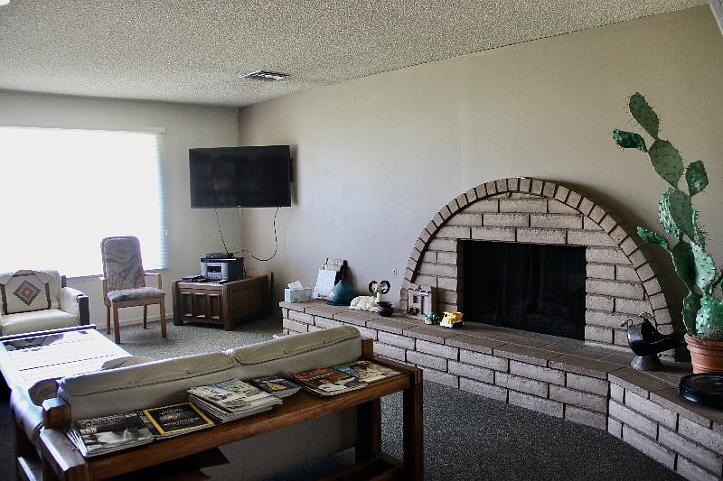 Fireplace room / lending library in office/clubhouse