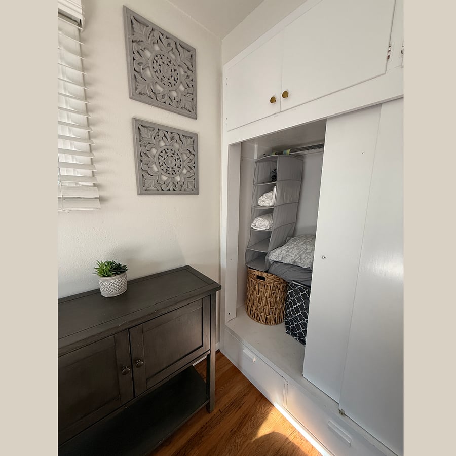 Bedroom 1 closet contains the essentials for a cozy stay. 