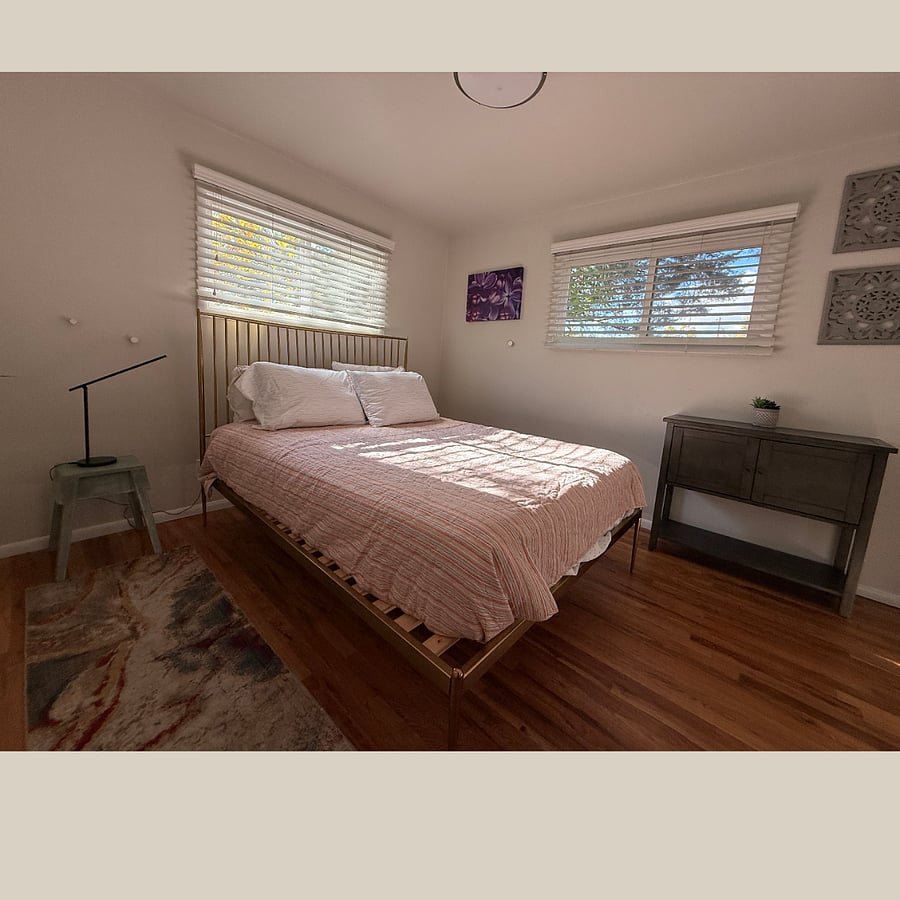 Bedroom 1 welcomes you to relax and enjoy the interior space. 