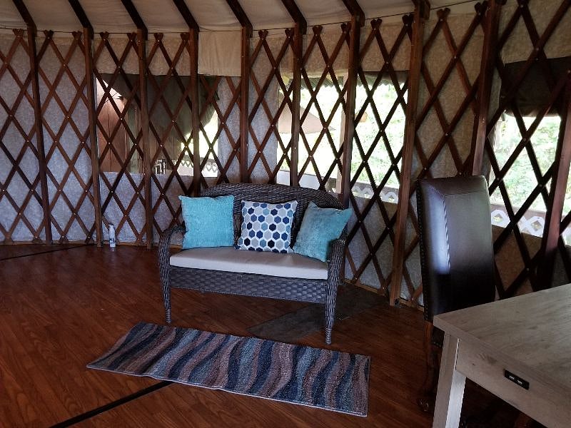 Inside the roomy yurt. Room to work-out or work on projects.
