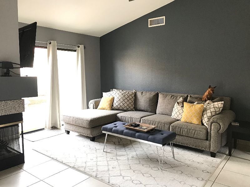 Living room with sliders to back yard. Functioning fireplace. 