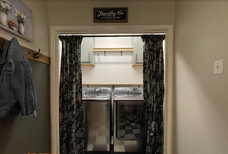 Laundry area with high-efficiency washer and dryer with steam setting