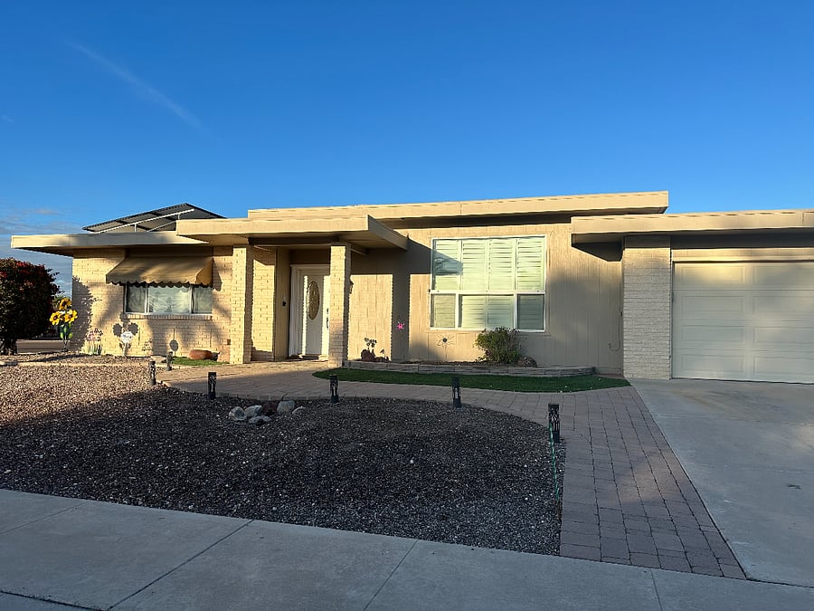 Quality home with two car garage, Tesla Charger and solor panels.