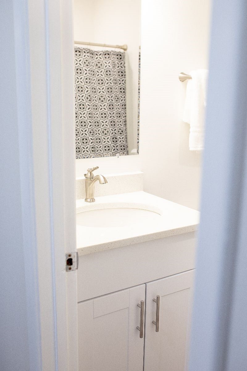 Updated bathroom with quartz countertop