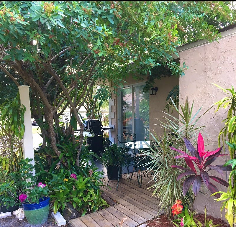 Enjoy breakfast on your private patio, or happy hour! Or both. . Sliding glass doors to the kitchen! When I moved here I was so shocked, I expected all sorts of insect life..and it is surprisingly un- buggy
