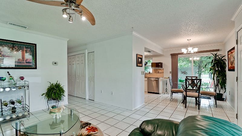 smart TV with cable and Netflix and Amazon YouTube etc. not shown but on wall opposite couch