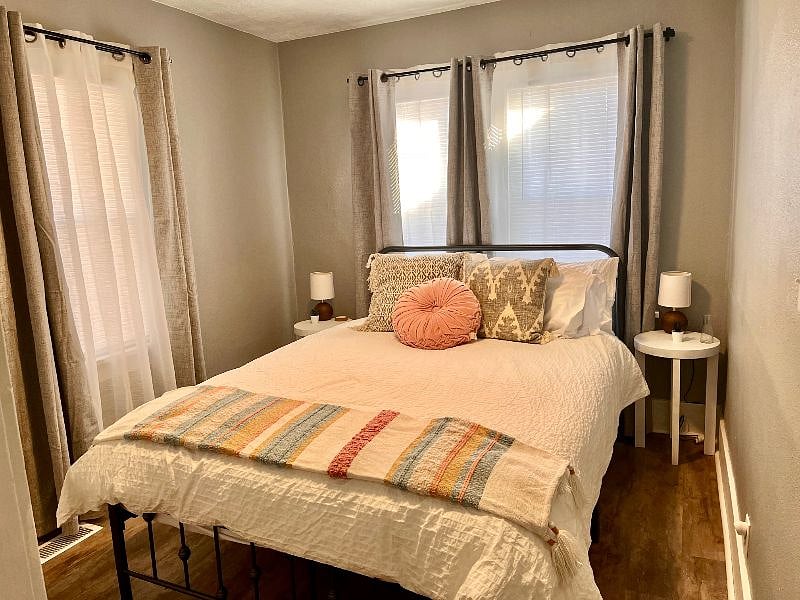 Comfy queen beds with blackout curtains.