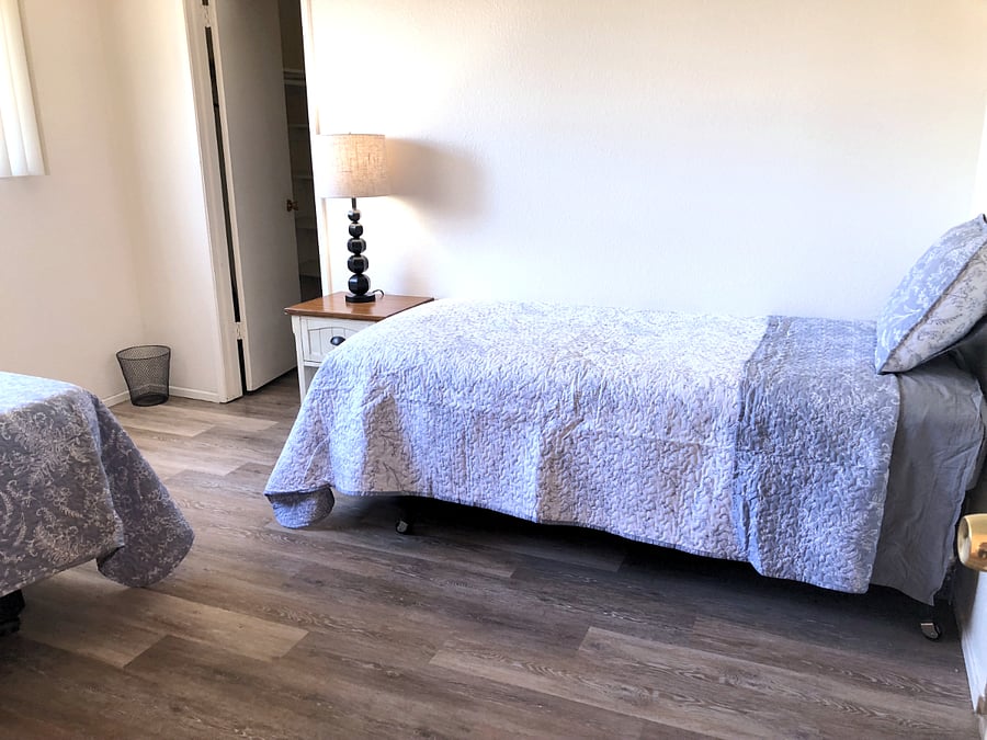 Master Bedroom with Ensuite bathroom, walk-in closet and 1 Full bed and 1 TwinXL.