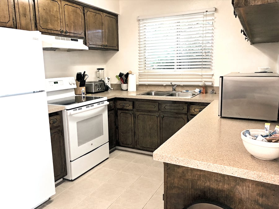 Kitchen is fully equipped with all appliances, pots & pans, dishware, cookware and utensils