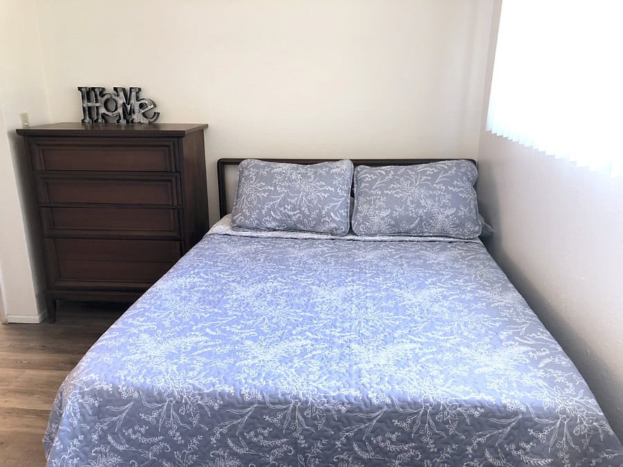 Master Bedroom with Ensuite bathroom, walk-in closet and 1 Full bed and 1 TwinXL.