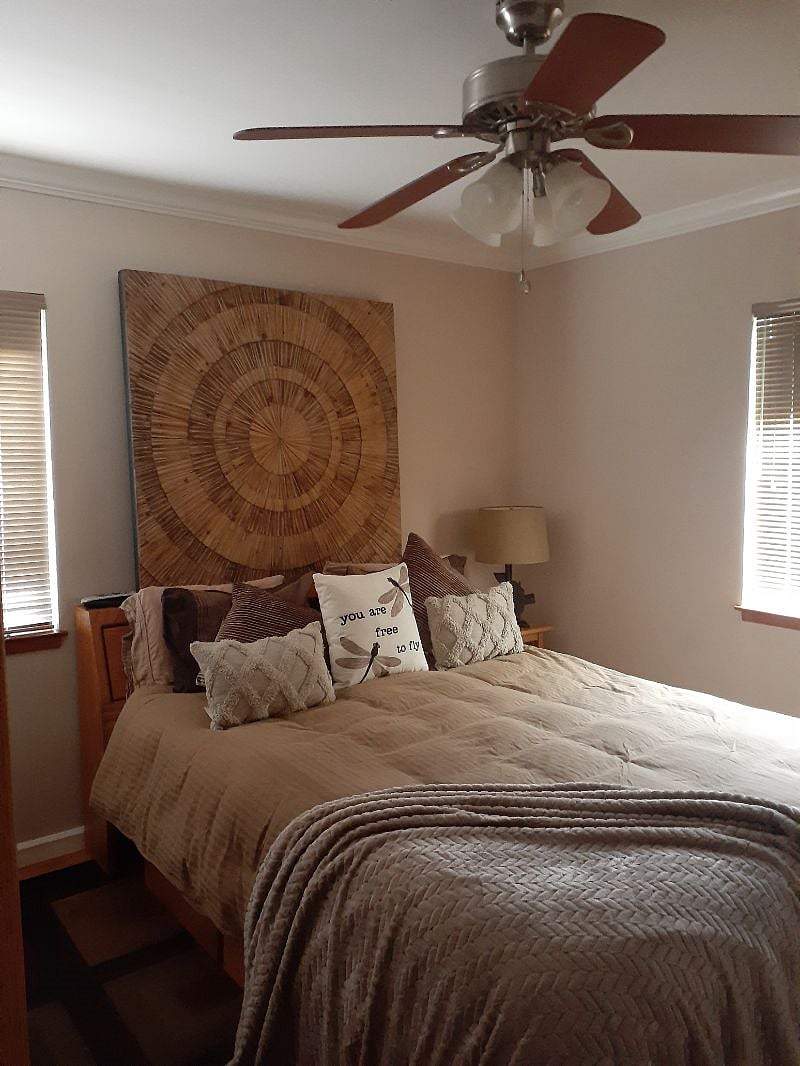 Bedroom #2 with queen bed, closet, smart TV, dresser, small armoire and under bed storage