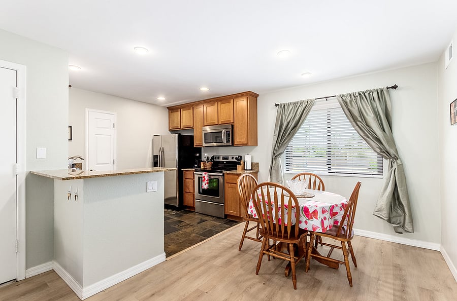 Designated Dining Area is right by the fully equipped Kitchen, big Pantry