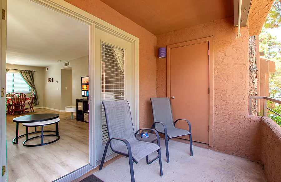 Family Room - 65" Smart TV as seen from the shady Balcony