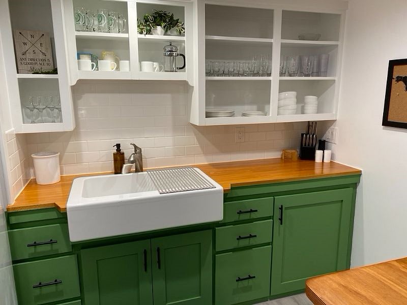 Large farm sink and fully stocked kitchen
