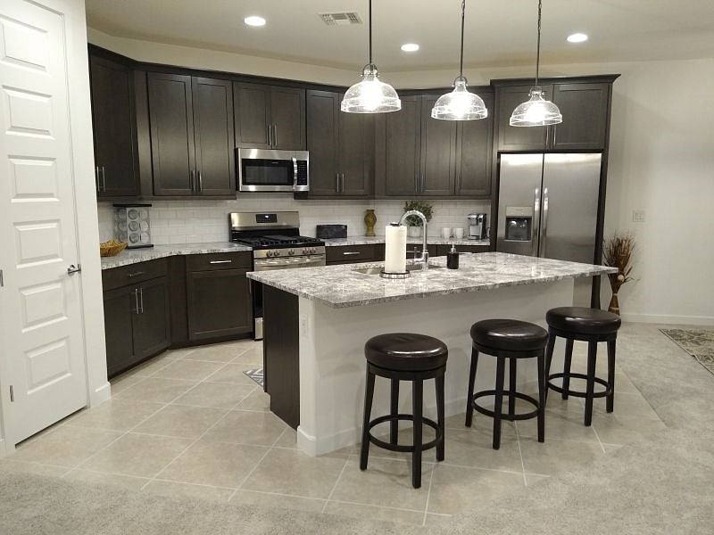 Large kitchen with breakfast bar