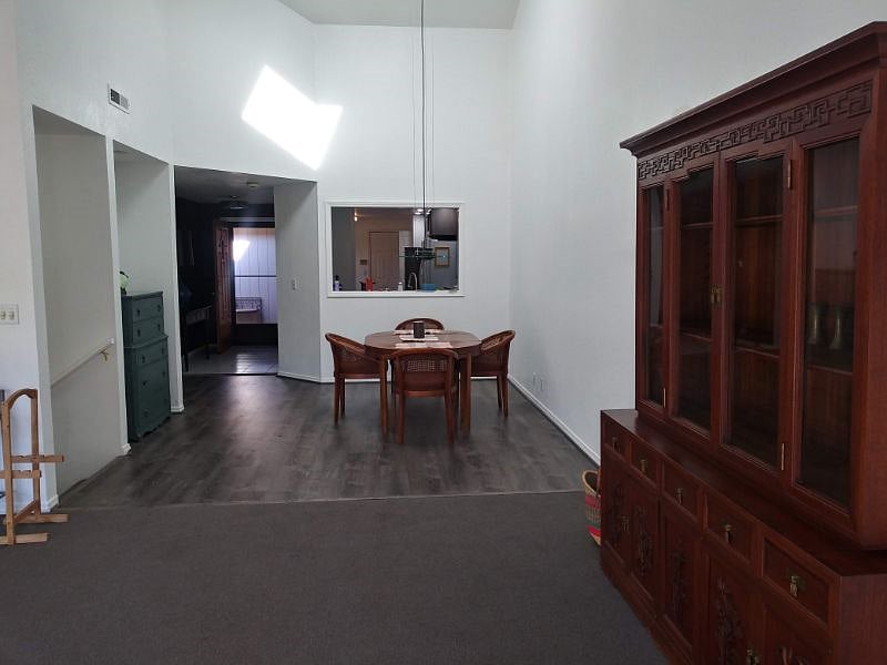 Looking toward the dining room and kitchen from living room.