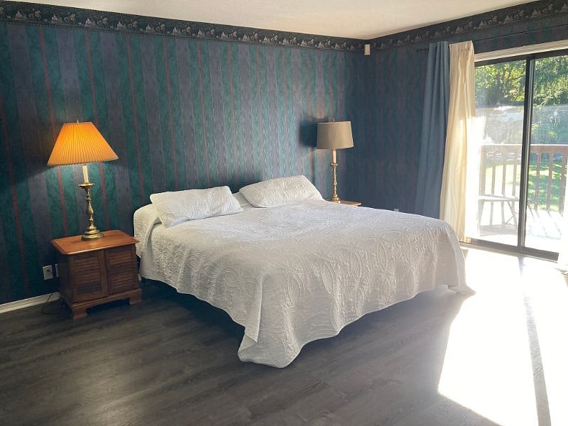 Downstairs bedroom has walkout deck and ensuite bathroom