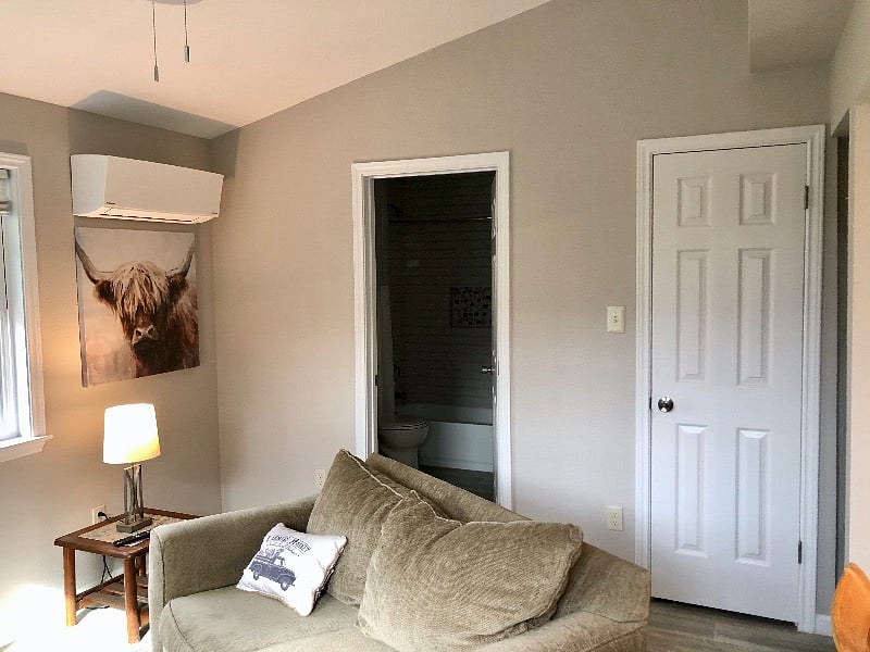 Cathedral ceiling in living room. Bathroom - left door, walk-in closet on right. New AC/Heating unit will keep you very comfortable.