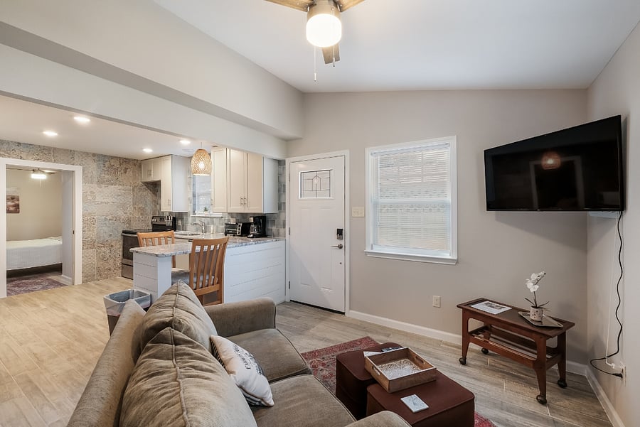 Large smart TV in open concept living area with strong Wifi.