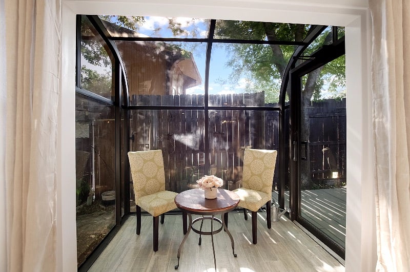 Common area: Breakfast Nook to relax with your morning coffee and connect with the outdoors.
A door on right leads to a private deck area with seating