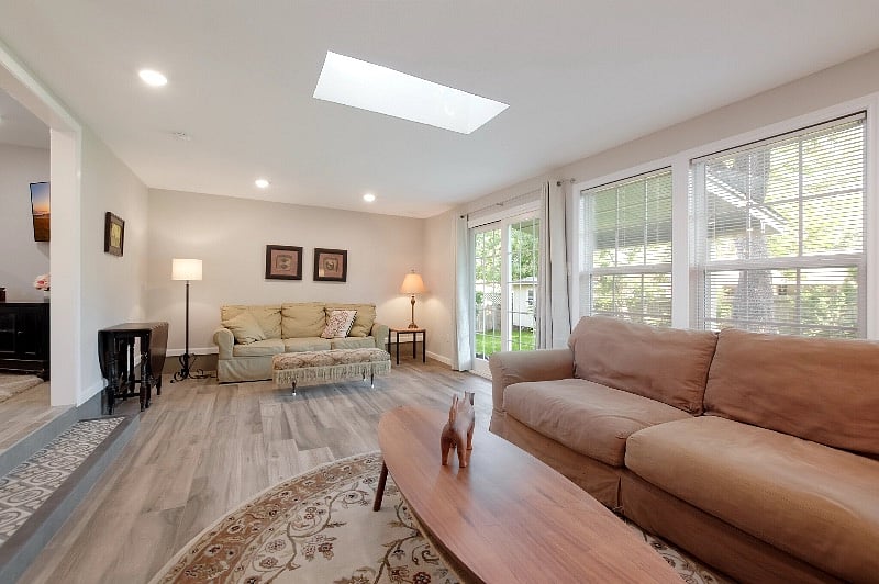Sunroom: second large living area with access to large backyard.
One fold-out couch for use when needed