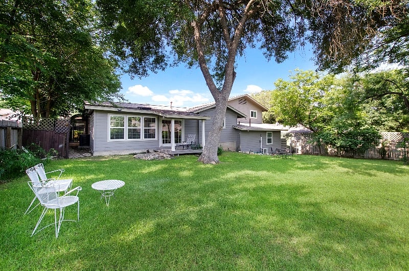Large private back yard with motion sensor flood lights. Lawncare included.
Separate apartment with its own private entrance is located in the bottom right of home (other side of garage